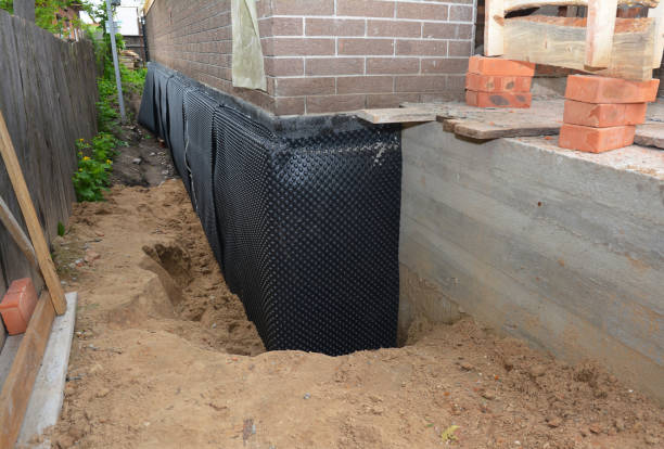 Happy homeowners after waterproofing job in Voorhees